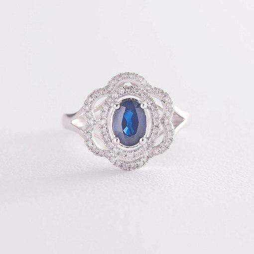 Золотое кольцо "Цветочек" с синим сапфиром и бриллиантами
